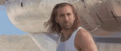 Animated GIF from the movie Con Air with
      Nicolas Cage winking at the camera.
